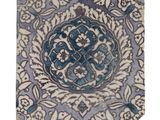carreau bleu et blanc orné d'un motif floral