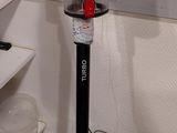 a vacuum that is sitting on the floor in the room
