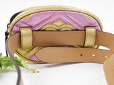 pink and gold cross body bag with gold trimming and leather strap