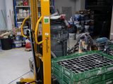 a picture of a fork lift in a garage