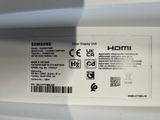 a close up of the back of a samsung phone