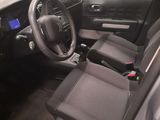the interior of a car with a dashboard and a steering wheel