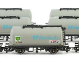 six toy train cars that are lined up on a white surface