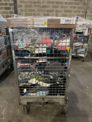 a cart with many items in it in a warehouse