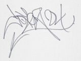 someone is writing on a piece of paper with a pen