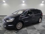 a picture of a black car parked on a checkered floor