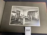 black and white photo of an old photo of a woman working in a factory