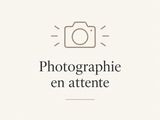 the logo for a photographer ' s business