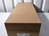 an open brown box sitting on top of a white table