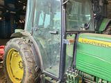 a tractor that is sitting in the dirt