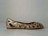 gold leather ballet shoes with cut out design on the sole