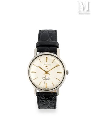 gros plan d'une montre sur fond blanc avec un bracelet noir