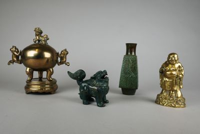 three different types of vases and statues on the table