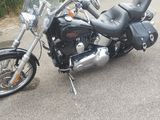 a motorcycle that is parked on the side of the road