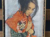 painting of a woman with a red scarf on a wooden easel
