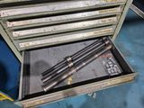 a tool box with two tools in it on the floor