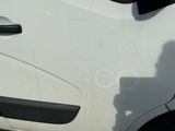 a white van with a logo on the side of it