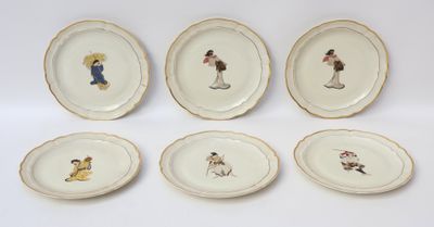 six plates with different designs of people on them on a white surface