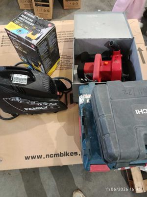 a box that has some tools in it on a table