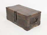 an old wooden box with a handle on it