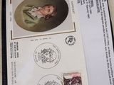 two envelopes with stamps and a picture of a man on them