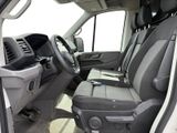 a view of the inside of a van with the driver ' s seat down