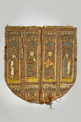a close up of a piece of cloth with a painting on it