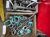 a box full of wrenches and other tools in it