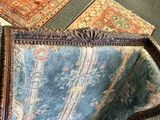 a picture of a chair that is sitting on the floor