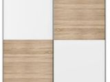 a white and wood sliding door with two panels