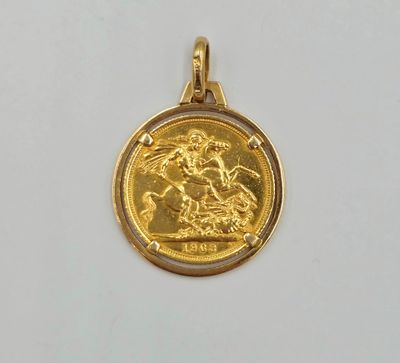 a close up of a gold coin with a horse and rider on it