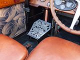 a brown leather seat in the front of a car