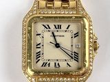 an image of a gold wrist watch with roman numerals and diamonds