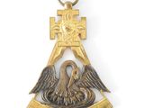 a close up of a metal object with a bird on it