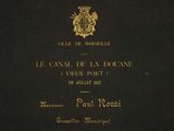 la couverture d'un livre noir orné d'une inscription dorée