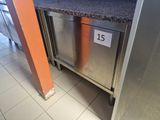 a stainless steel dishwasher in the middle of a kitchen