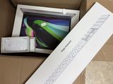 a box that has a laptop in it and a keyboard in it