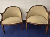 pair of french louis xvi style armchairs with upholstered arms