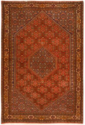 un tapis persan ancien aux motifs rouges et marron