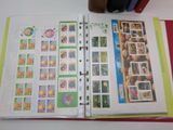 an open book with pictures on it on a table