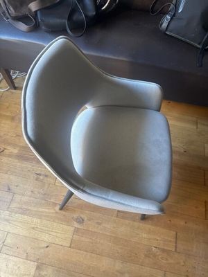a chair that is sitting on a hard wood floor