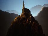 an image of a castle sitting on top of a rock in the middle of the ocean