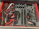 many tools in a tool box on the table