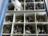 a blue box filled with lots of different types of screws