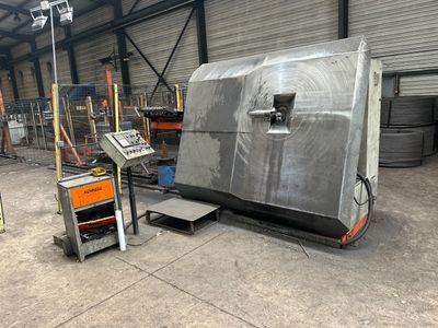 a large machine that is sitting in a warehouse