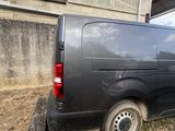 an image of a van parked in a lot