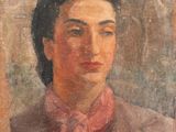 portrait of a woman in a pink shirt and a brown jacket