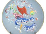 an image of a plate with a painting of a boat on it