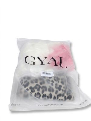 a plastic bag with a leopard print on it