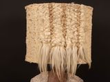 a woman with a knitted hat on top of her head